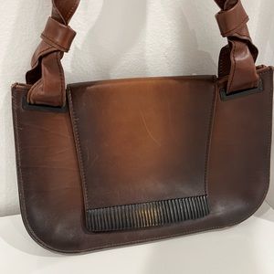 Unique authentic Gucci burnt brown over shoulder leather bag